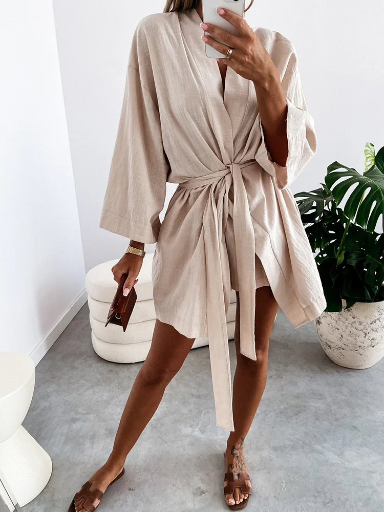 

Women's Casual Summer Loose Dress 2021 Spring Fashion V-neck Solid Color Long-sleeved Dress Flared Sleeve Elegant Lace Suit