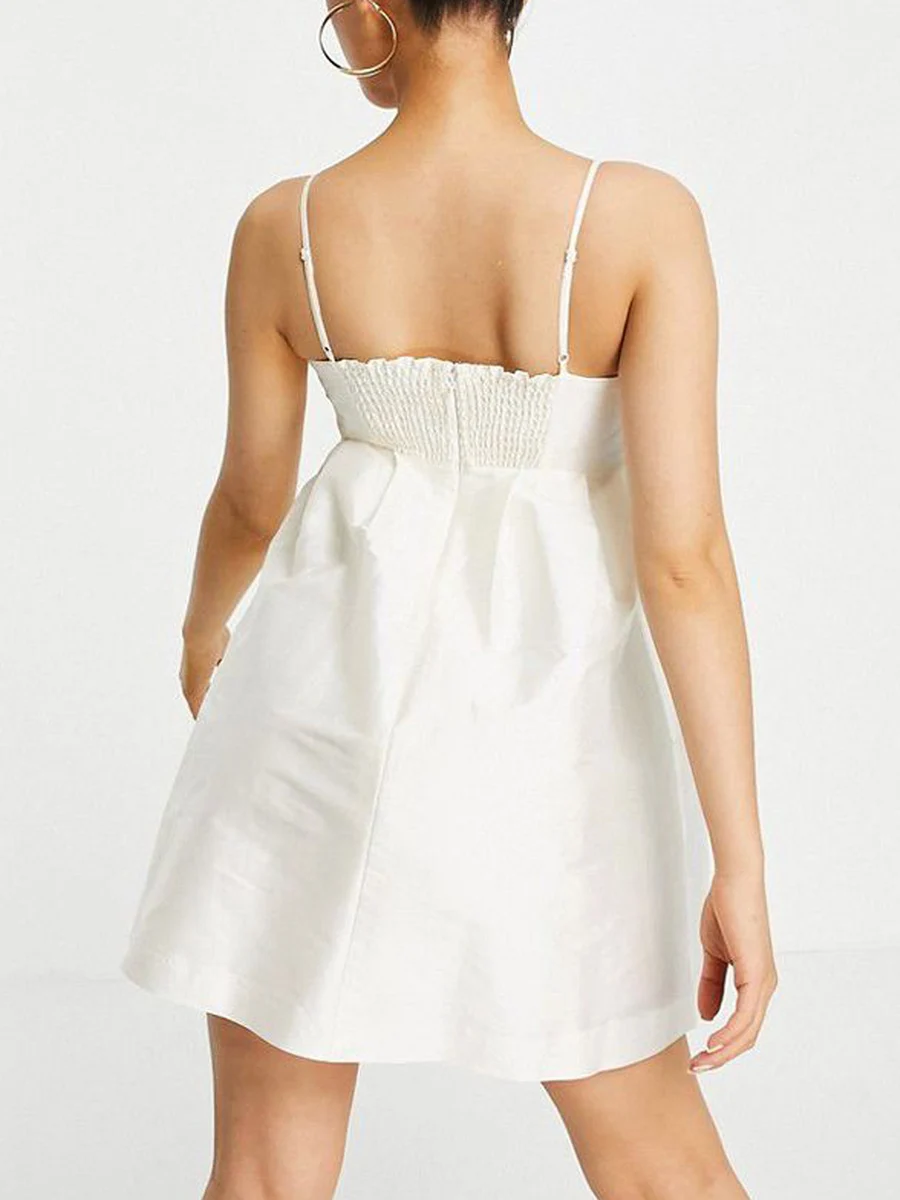 Elegant and Chic Sleeveless Dress with Ruffled Hem Tie Straps and Button Front - Perfect for Summer Parties Cocktails Beach