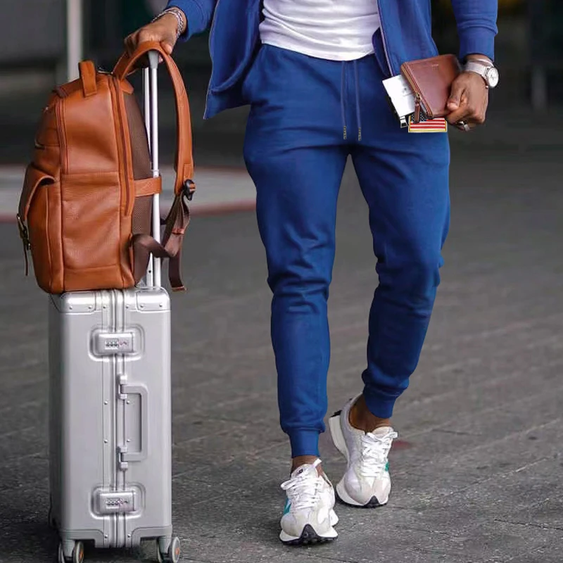 

2023 Spring, Autumn, and Winter Leisure Pants Drawstring Solid Color Printed Polyester Material Sports Men's Leisure Pants