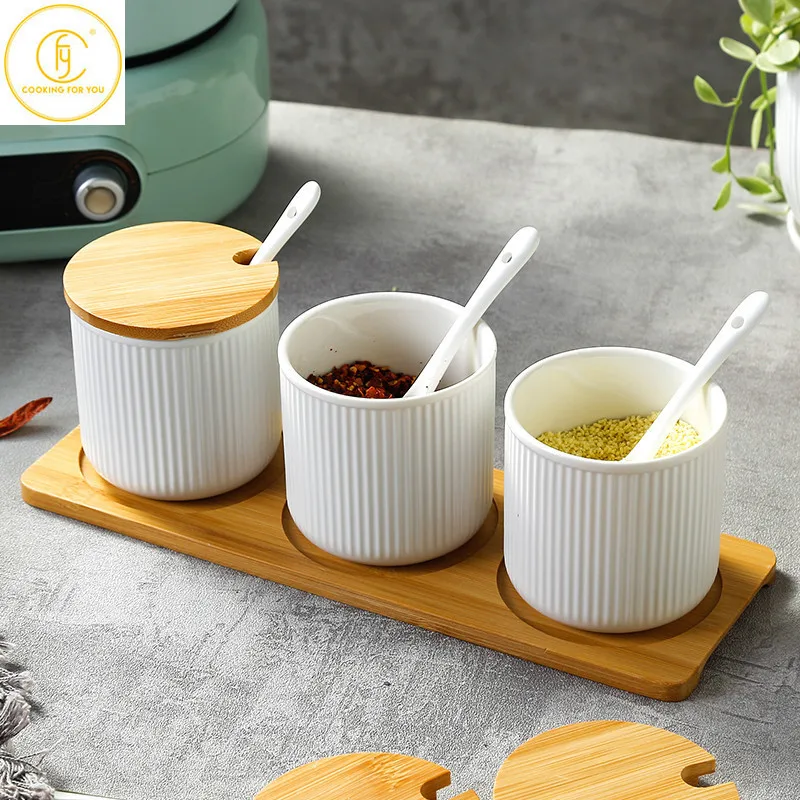 

3pcs Creative Ceramic Seasoning Jar with Lid and Spoon Salt Cumin Sugar Pepper Oil Seasoning Jar Wiith Bamboo Tray Spice Tools