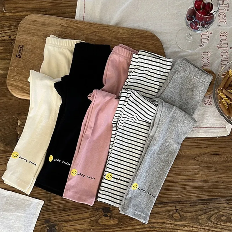 

2022 Autumn Winter Baby girls elastic leggings cartoon smile letters printed Kids skinny pants cotton leggings
