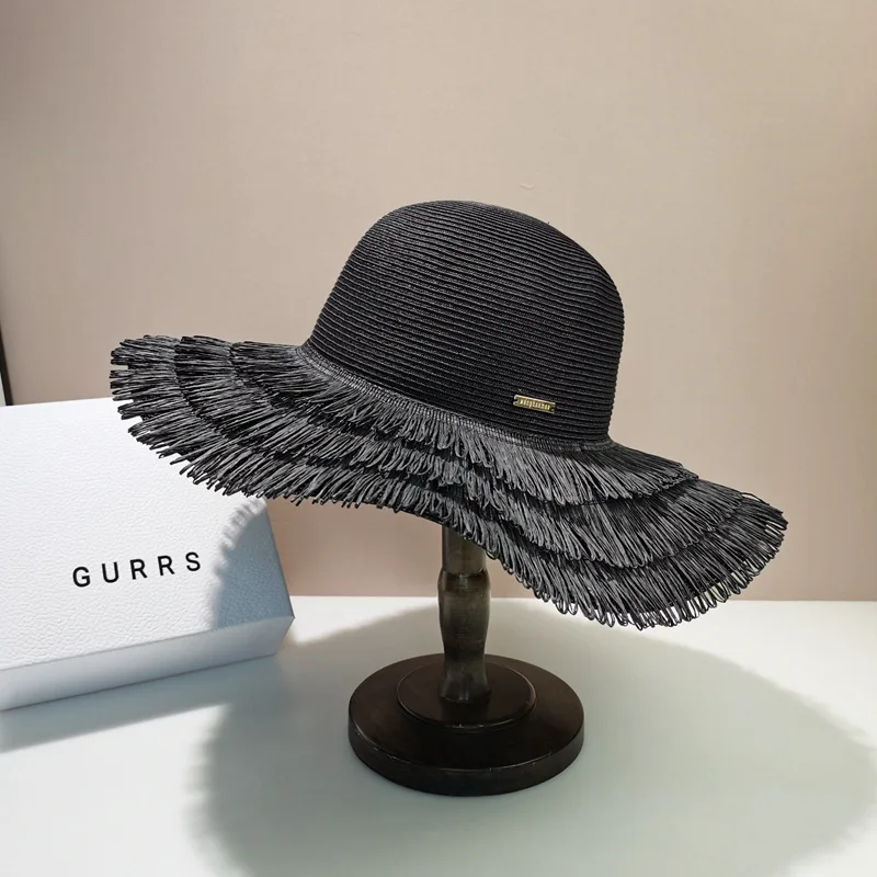 

Ins xiaozhong.com red name Yuanfeng Big Brim Straw Hat feminine temperament tassel seaside holiday Beach Hat sun visor