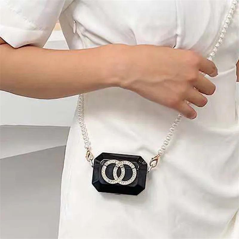 Женская мини-сумка через плечо с жемчужинами