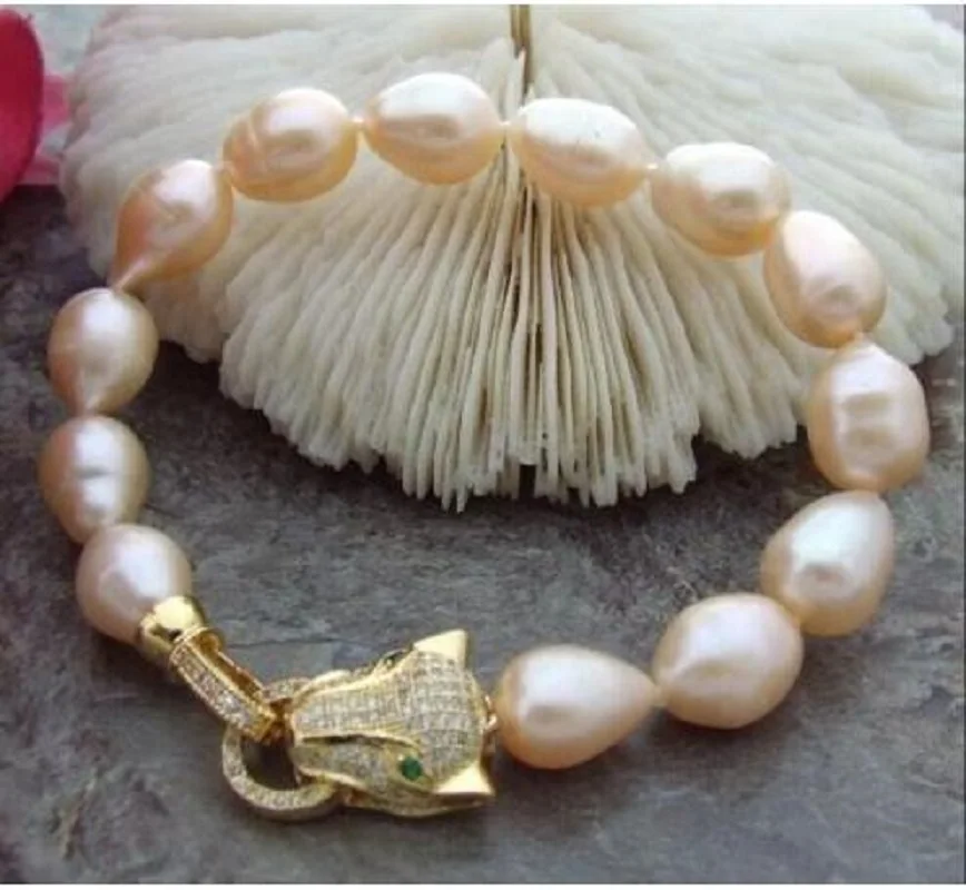 

Gorgeous AAA+11-12mm South China Sea Authentic Pink Baroque Pearl Bracelet 7.5-8 inches-