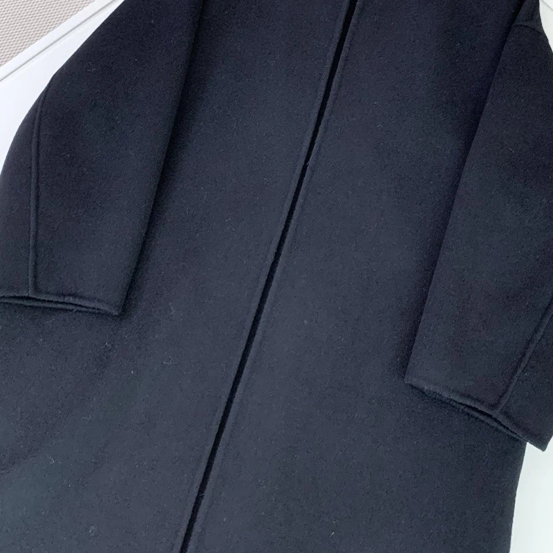 Рисунок 5 - Длинное пальто с поясом NIGO