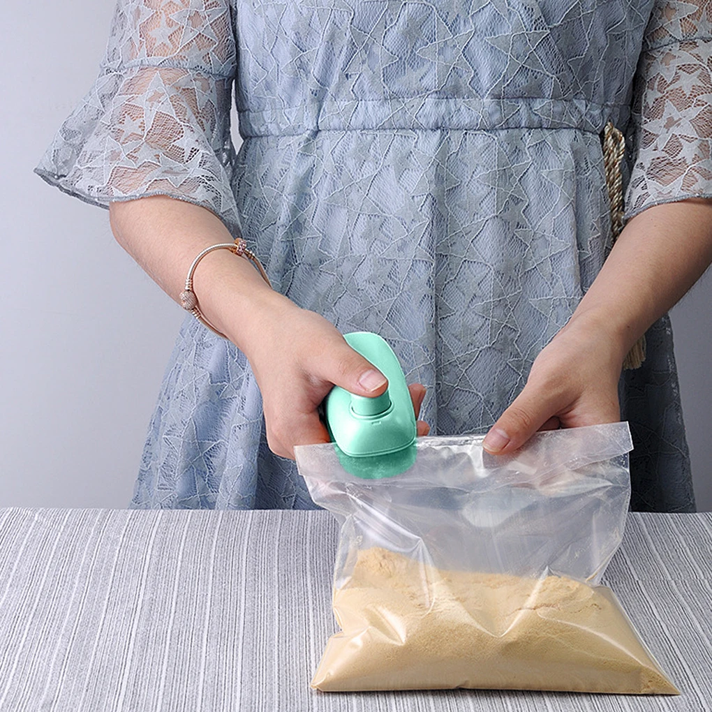 

New Food Sealer Handheld Snacks Packaging Sealing Machine Portable Camping Preservation Storage Plastic Bag Seal Clip