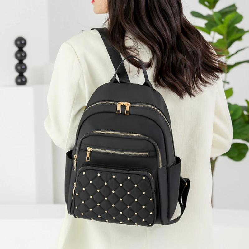 

Fashion Bagpack Women High Quality Nylon Rivet Rhombus Backpacks Female Big Travel Back Bag Large School Bags For Teenage Girls