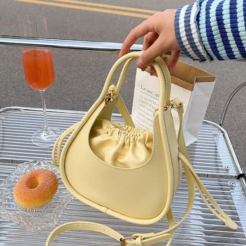 

2022 Summer trend New Niche Women's Bag Drawstring Inner Daily Student Office Design All-match Messenger Bag Fashion Handbag