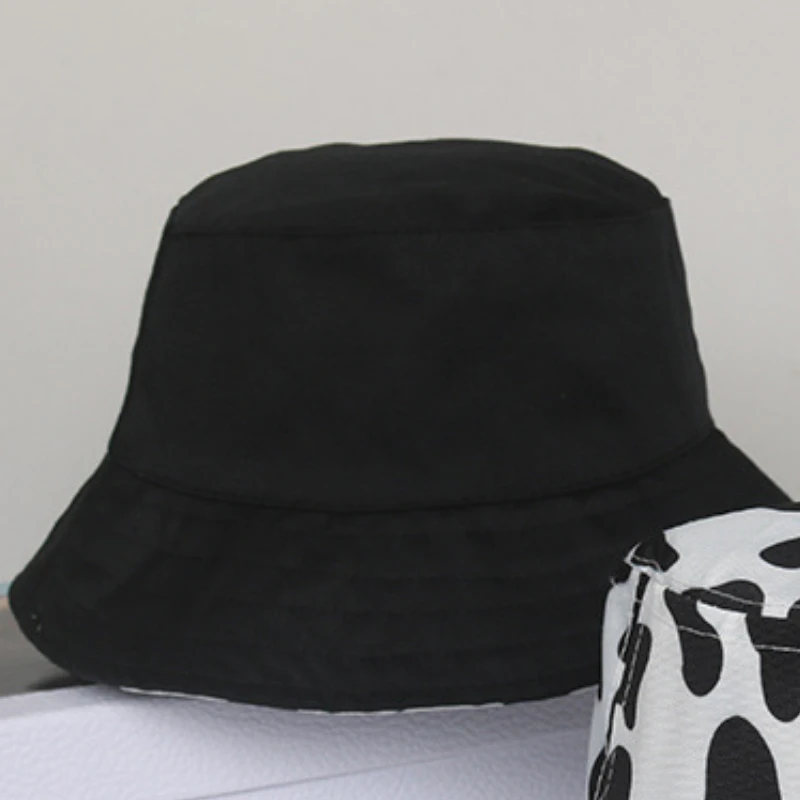 

New Unisex Fashion Reversible Black White Cow Pattern Bucket Hats Fisherman Caps For Women