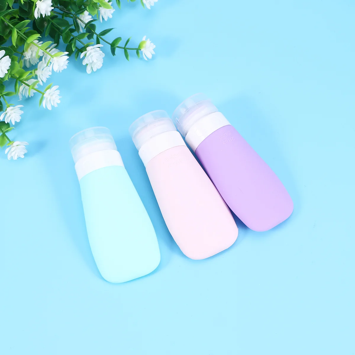 

3pcs 60ML Silicone Dispensing Bottle Sub-bottle Travel Set Portable Cosmetic Bottle (Purple & & Blue)