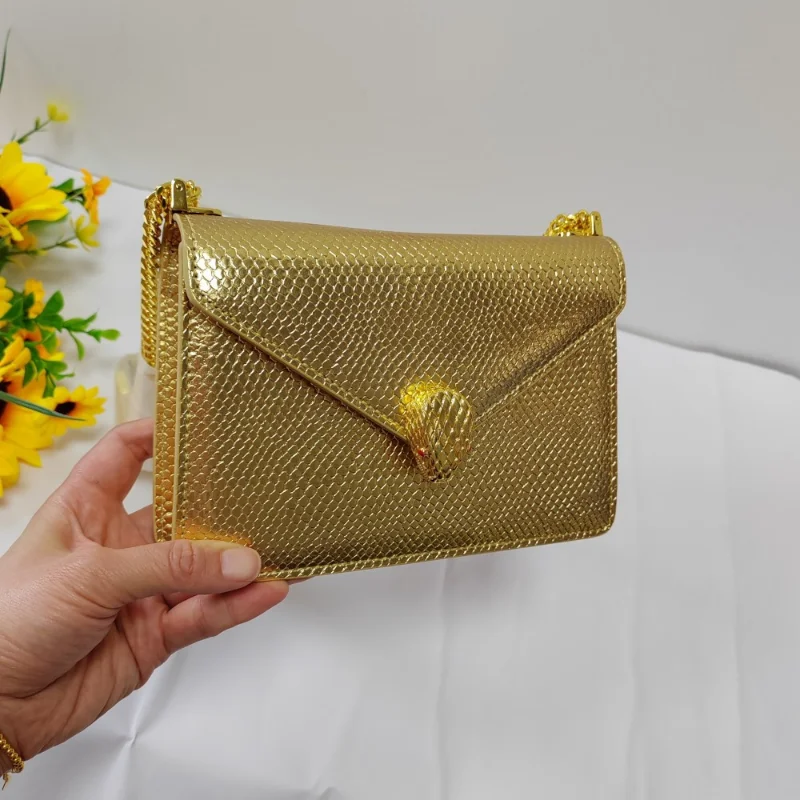 

2023 Hotsale Snake Serpentine Handbag Metallic Shoulder Girdle Snake Metal Logo Cross Body Bag Luxury Women Lady Shoulder Bag