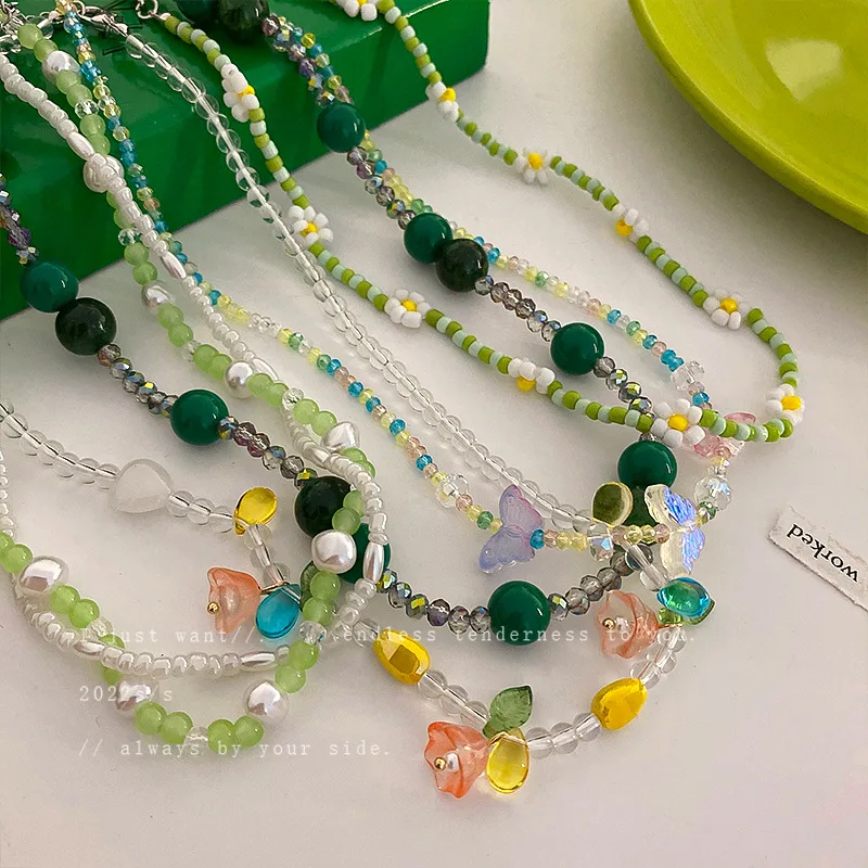 

Small Fresh Green Lily of The Valley Flower Butterfly Pearl Necklace Korean Fashion Sweet Girl Collarbone Chain Net Red Necklace