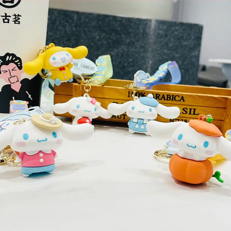 

Anime Cinnamoroll Sanrioed Cute Cartoon Four Seasons Pvc Doll Pendant Key Ring Figure Kawaii Car Keychain Ornaments Girls Gifts