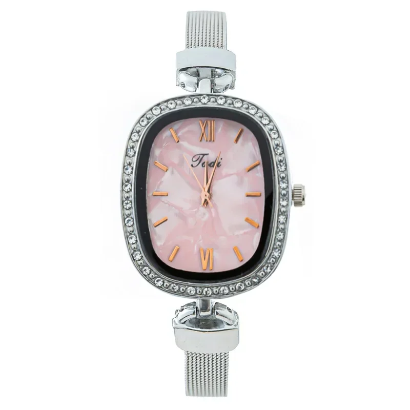 Женские часы с ракушечным циферблатом овальные кварцевые наручные со стразами