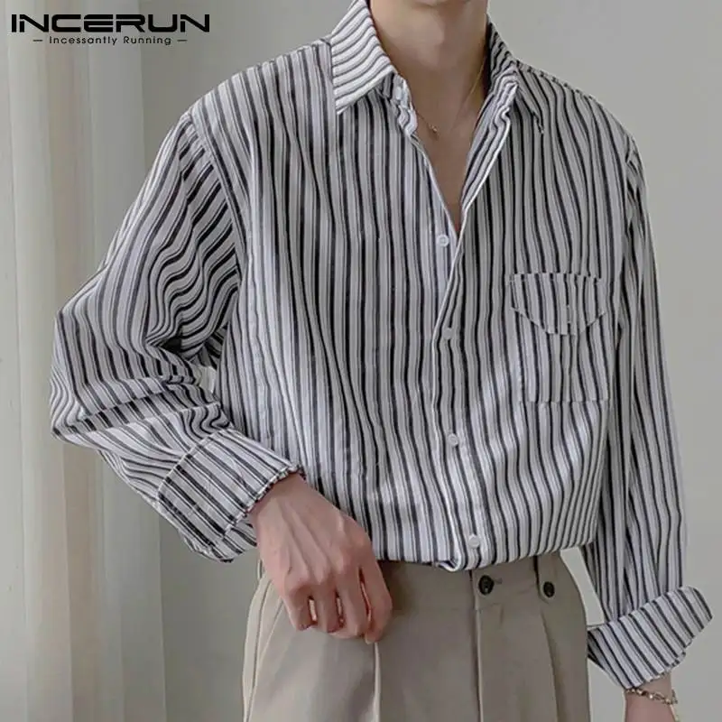 

Красивая хорошо облегающая Новая мужская стильная полосатая блузка, Повседневная Уличная одежда, стильная Свободная рубашка с длинным рук...