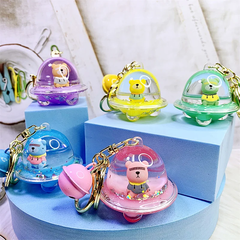 

Cartoon Liquid Floating Oil Planet Bear Key Chain Star Sequins Spaceship Astronaut Bear Keychain Bag Pendant Keyring Gifts