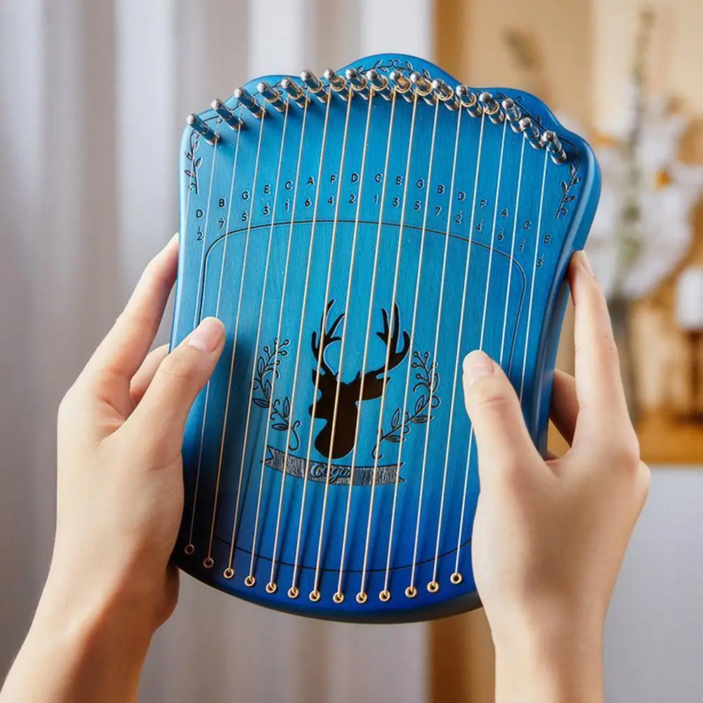 

Фингерплей Lyre Harp 17 струн Harp Lyre портативный пианино Harp инструмент музыкальный 17 начинающих с Lyre тюнинг Рычажные струны L3q6