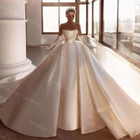 white satin wedding dresses with long train beaded sleeveless bridal gowns robe de mariee arabic dubai pearls bridal gowns