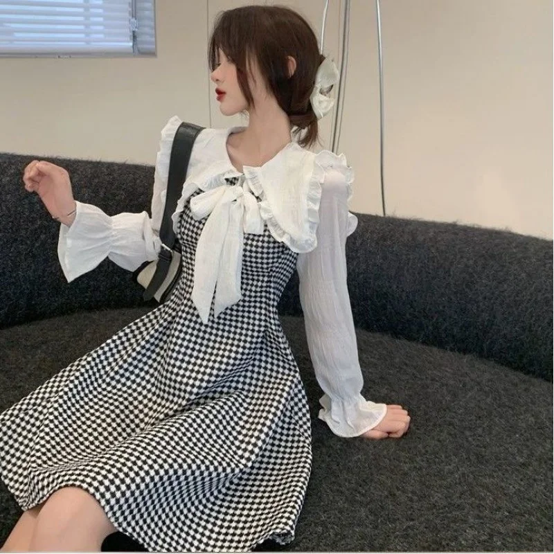 

Женское шифоновое платье в клетку с длинным рукавом