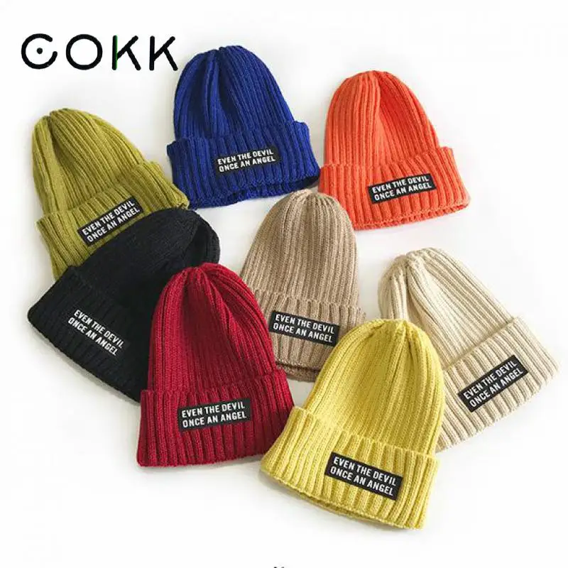 Шапка-бини унисекс теплая шапка с надписью и ярлыком Повседневная вязаная для