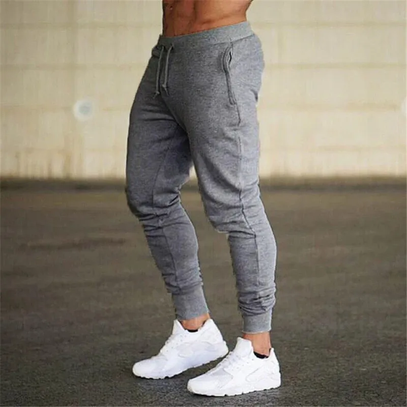 

Однотонные спортивные брюки 2022, мужские брюки, штаны для тренажерного зала, фитнеса, тренировок, мужские весенне-осенние хлопковые облегающие брюки для бега
