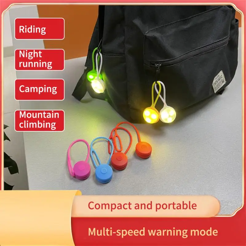 

Popular Silicone Backpack Mini Bicycle Light For Night Riding Easily Bicycle Warning Light Rear LED Taillight For Cycling Safety