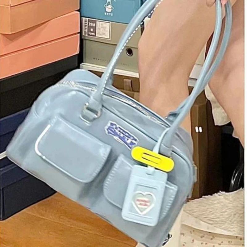 

Retro college wind large capacity armpit bag female 2023 new ins niche tide brand versatile shoulder bag