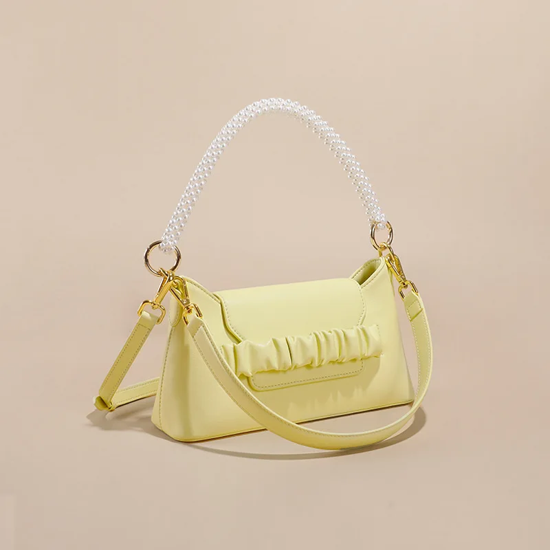 Рисунок 4 - Компактный кошелек с жемчужинами и ремешком на плечо