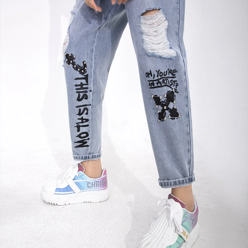 Women's spring and summer new original trendy INS personality graffiti rivets printed hole grinding white straight jeans