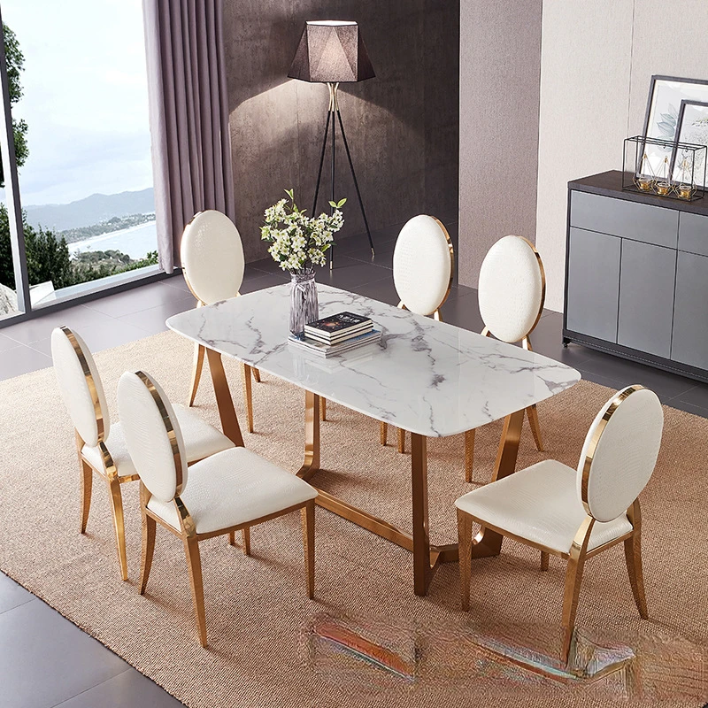 

Nordic marble dining table rectangular postmodern light luxury simple small unit stainless steel gilded dining table and