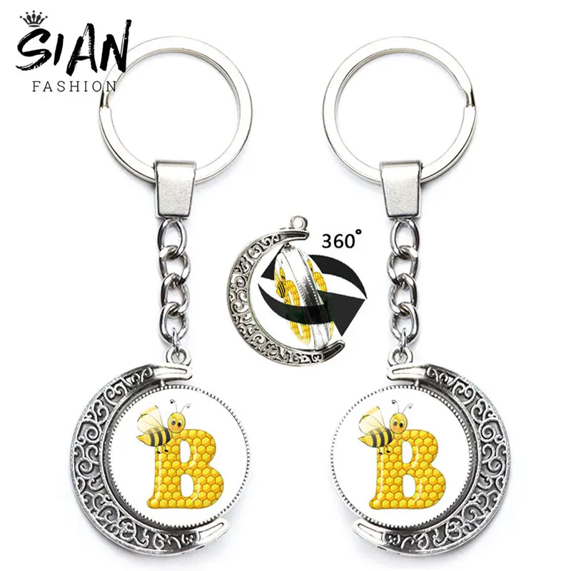 

Cute Bee A-Z Initial Letter Kerychain Honeycomb English Alphabet Glass Dome Key Chains 360 Degrees Rotated Moon Key Accessories