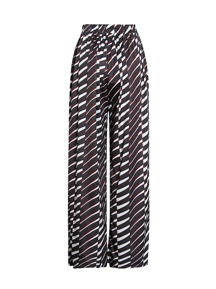 Женские брюки в полоску с высокой талией и карманами