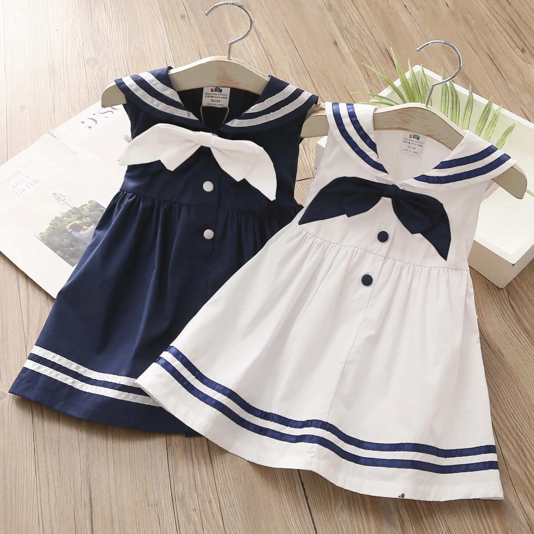 

Детское летнее платье без рукавов, с бантом и воротником-лодочкой