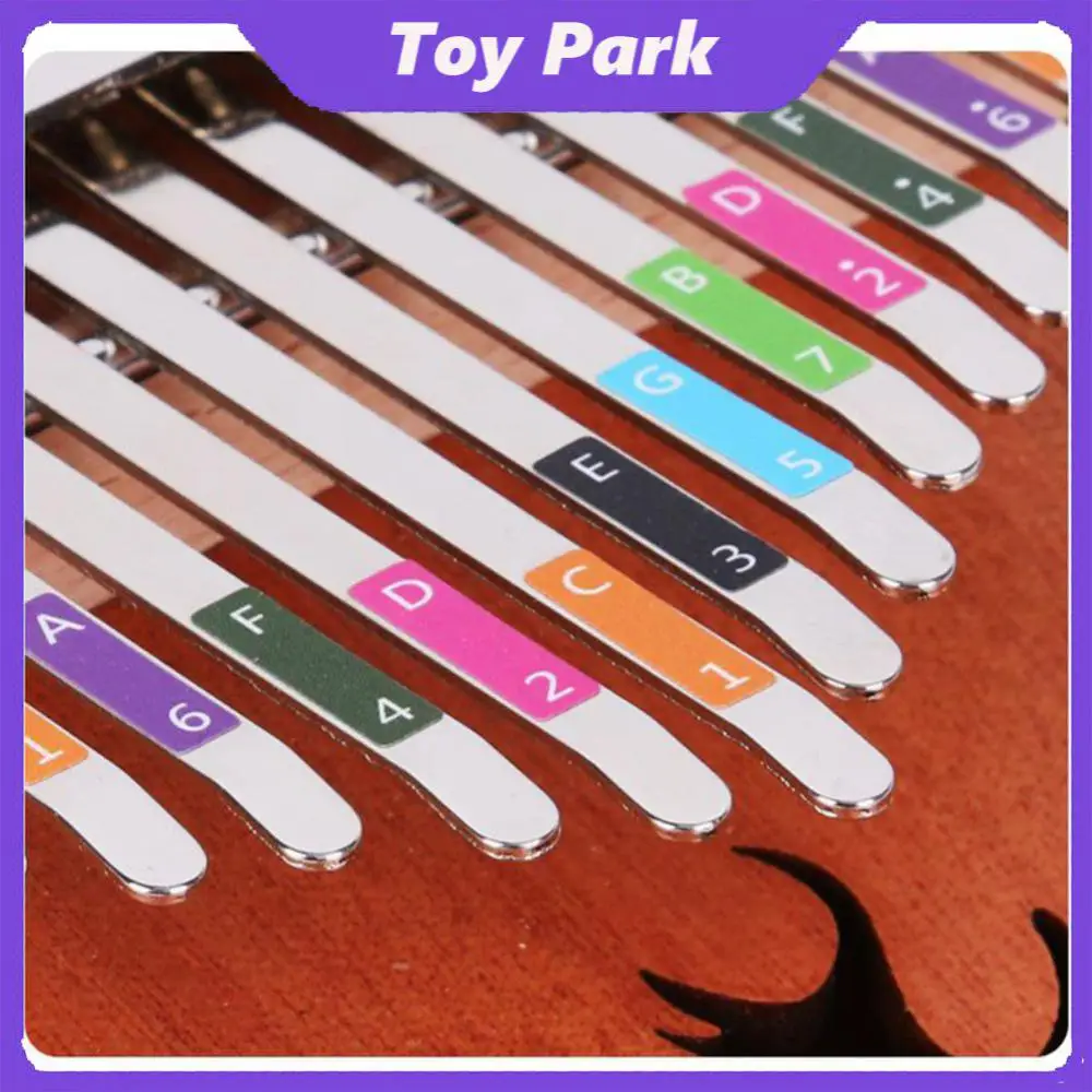 

Environmental Friendly Phonetic Symbols Thumb Piano Step Paste Five Finger Harp 17 Tone Phonetic Label Instrument Equipment