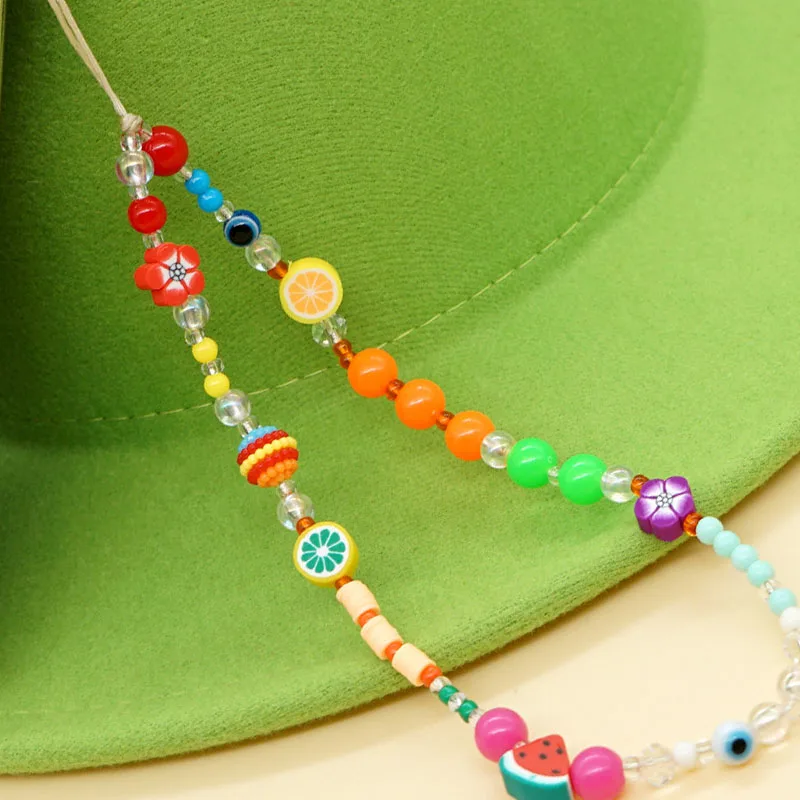 

Simple Bohemian Style Spring and Summer Vacation Travel Rainbow Resin Flower Wrist Phone Chain