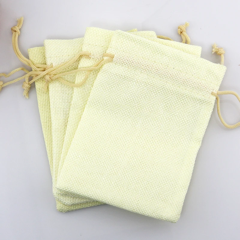 

Hot (100 pcs/lot) 7*9cm Beige color Linen Fabric Jute Drawstring bags Gift package bags Natural Burlap Bags Reusable home decor