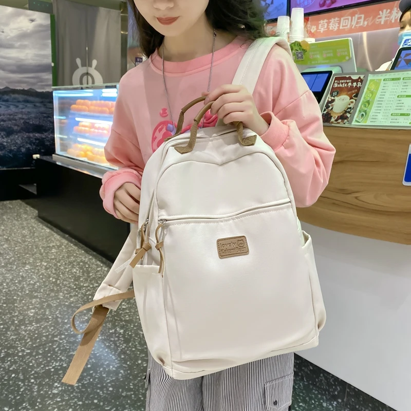 

EnoPella Fashion Backpack Waterproof Nylon Women For Teenager Shoulder Girls Book bag Black Female Mochila Rucksack