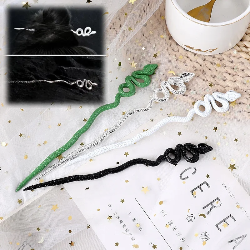 Металлическая зелёная заколка для волос в форме змеи