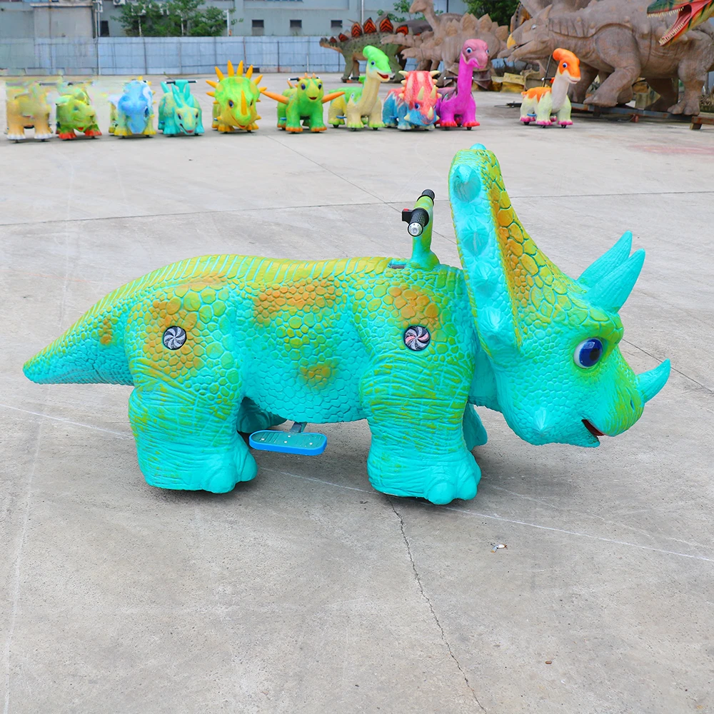 Детский скутер-динозавр работающий от монет