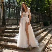 Shining Sweetheart Wedding Dresses 2022 High Slit Backless Bow Shoulders Bridal Gown Sweep Train Robe De Mariée For Sexy Women