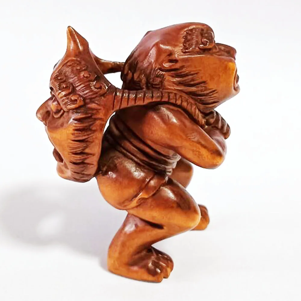 

Резная фигурка из самшита Они Человек с маской