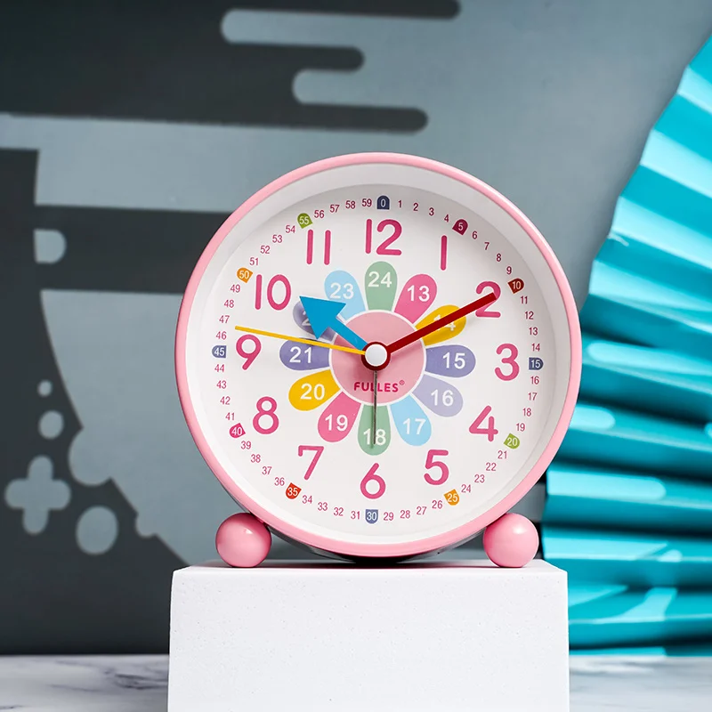 

New alarm clock for children in early childhood education Primary school students use bedside clock to learn alarm clock Simple