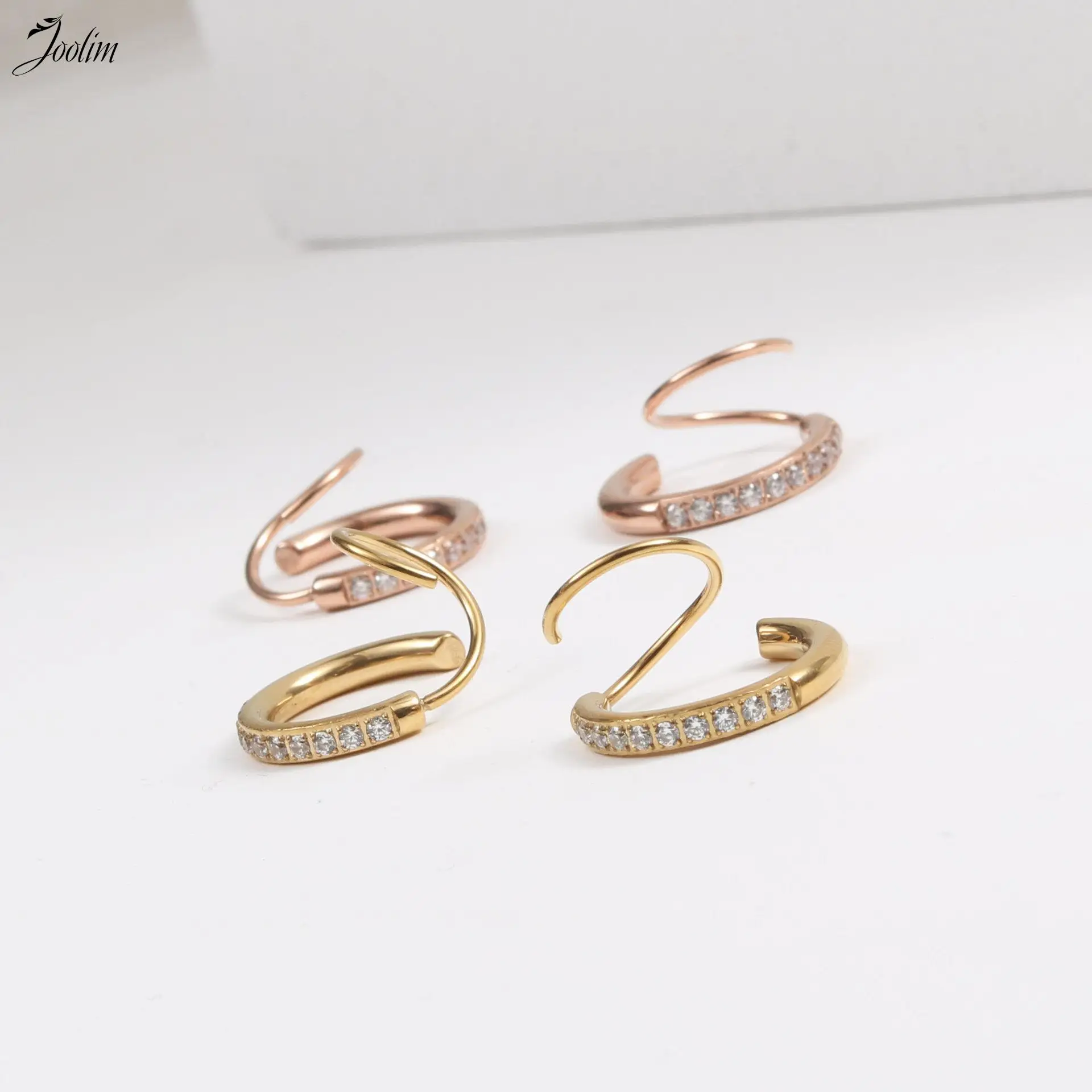 

Waterproof & Tarnish Free Fashion Spiral Ear Pin Full Drill Earrings Stainless Steel Jewelry