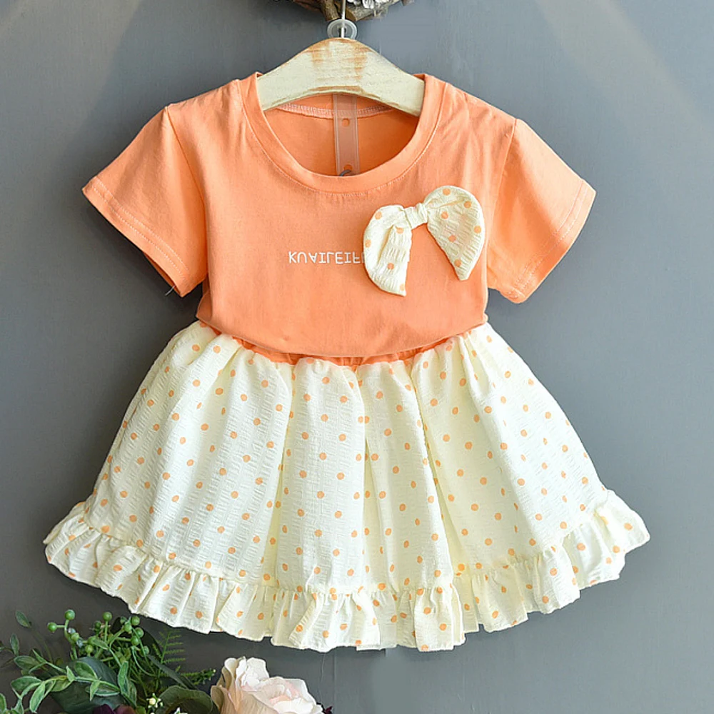 

VigoAnne 2022 Girls O Neck Short Sleeve Top Letter Bow Tops + High Waist Korean Polka Dot Ruffle Skirt 2pcs Children Kids Suit