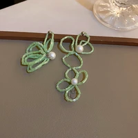 lovoacc 2022 spring summer green color braid flower long drop earrings for women hollow floral asymmetry dangle earring gifts