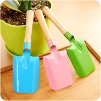 home gardening green planting shovel planting flowers in the wild planting loose soil playing with sand small shovel tool