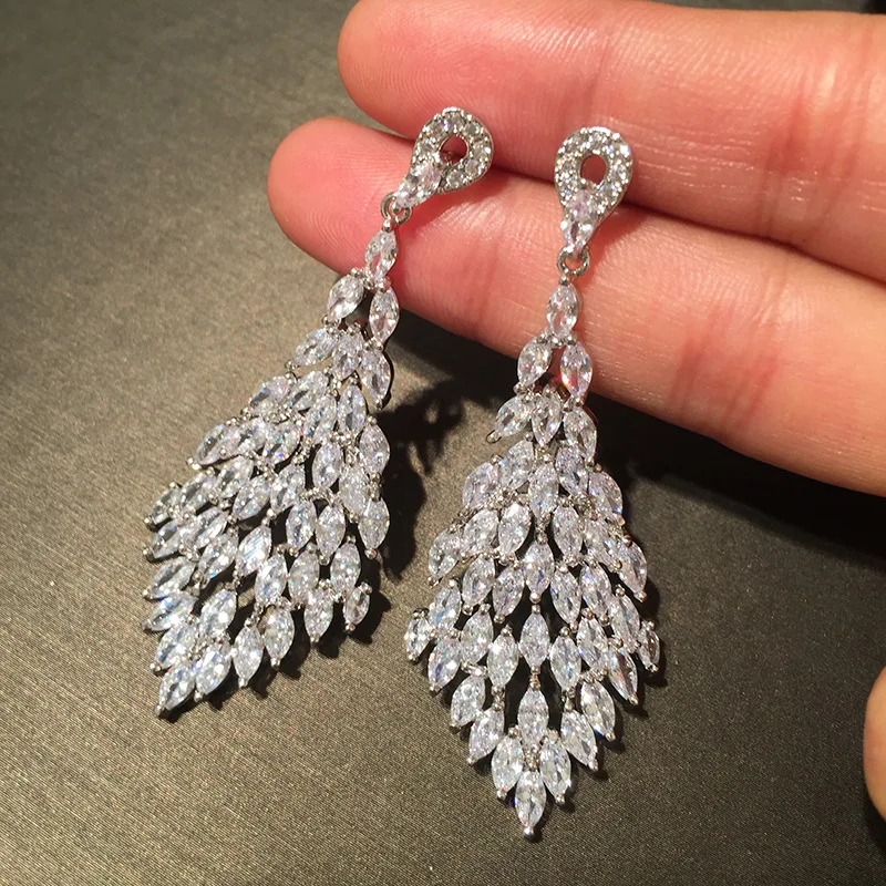 

s925 silver needle luxury leaf earrings long tassel super fairy dinner dress New Year's earrings simple atmosphere earrings