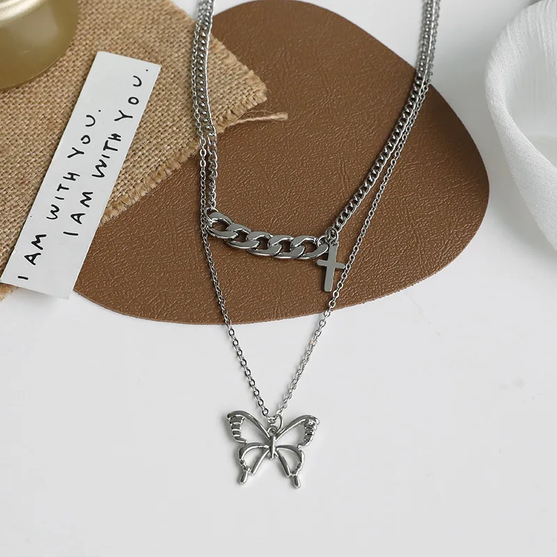 

Double layered butterfly necklace female collarbone chain cross hip hop cool 2022 new sweater chain accessories