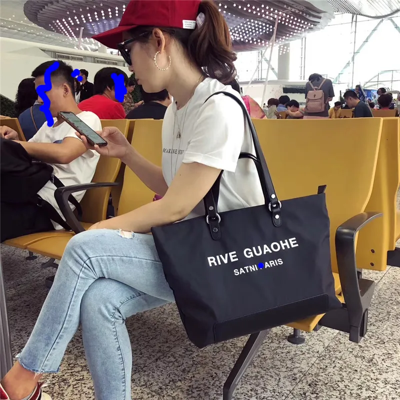 Han edition short web celebrity female bag portable shopping bag bag mass tourism BaoChao leisure tote bags