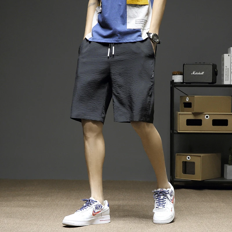 

Summer New Men's Thin Micro-Elastic Fashion Casual Loose Five-Point Pants Youth Beach Pants Slim Shorts Overalls Sweatpants